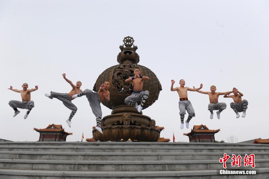 Monks practice Shaolin kung fu