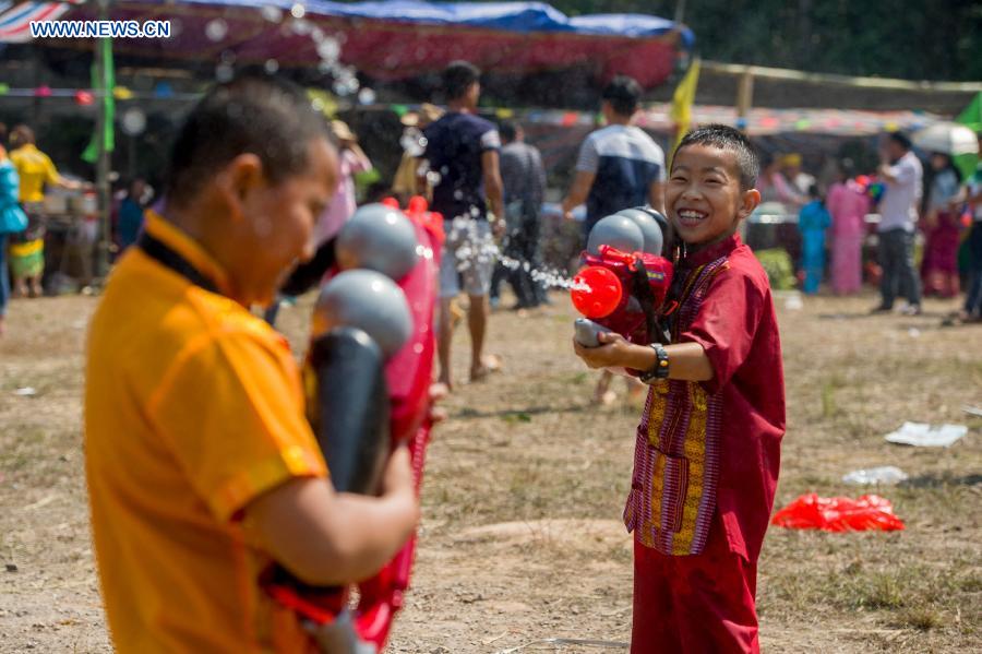 Celebration held for coming Water-Splashing Festival in SW China