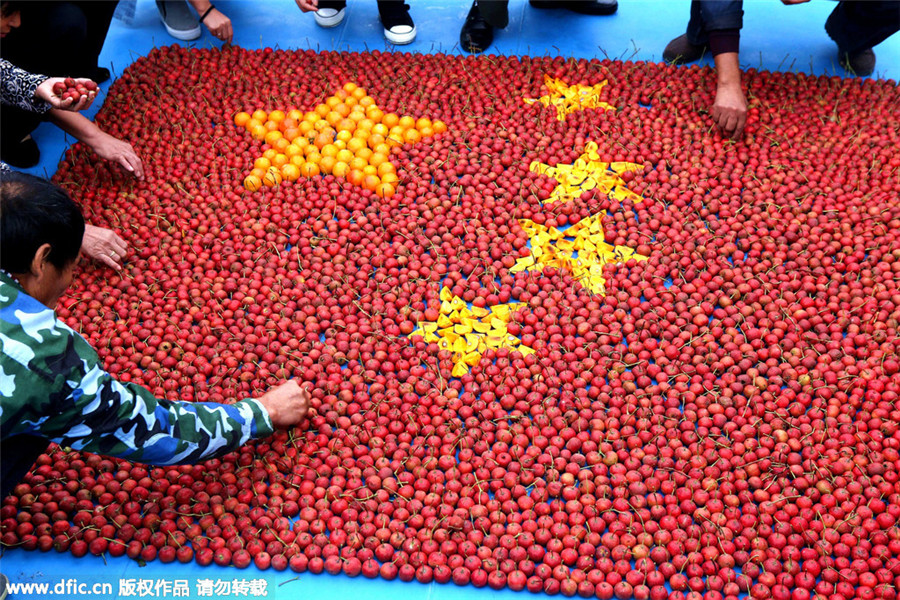 Creative giant flags celebrate National Day