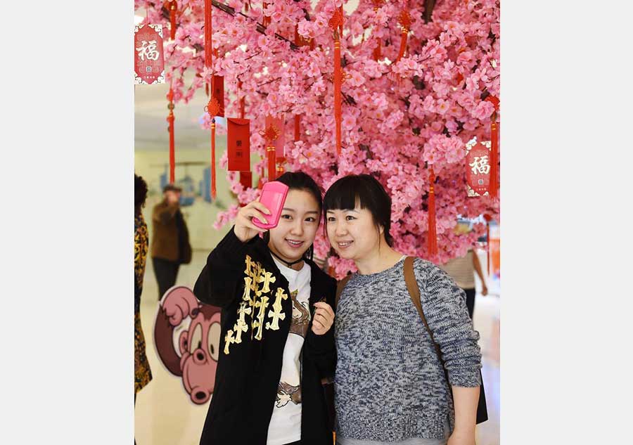 People visit indoor park to mark Chinese Lunar New Year in Harbin