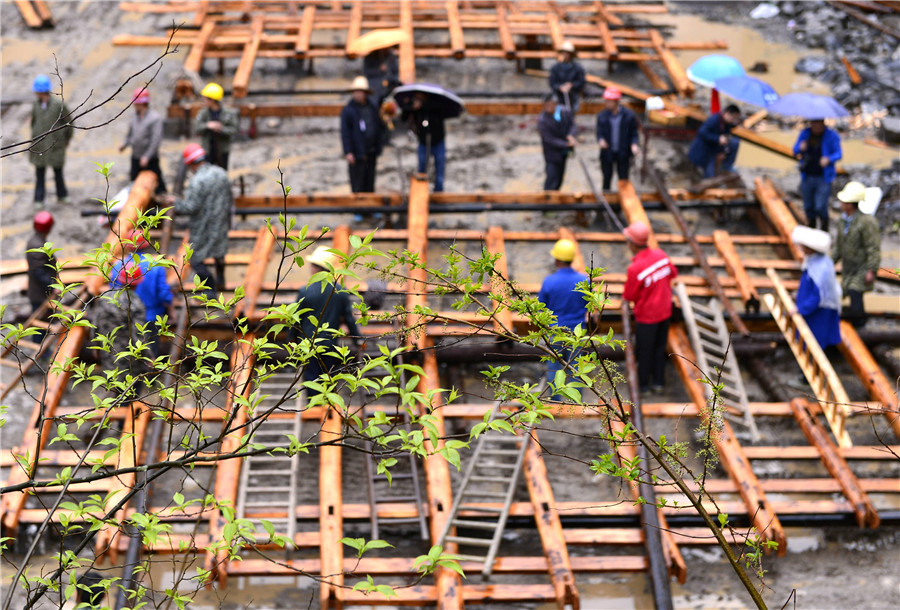 Ceremony held to start construction on a Tujia stilted house in C China