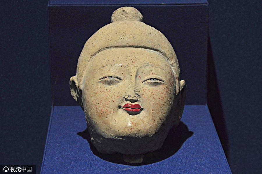 Chinese and Indian sculptures on display at the Palace Museum in Beijing