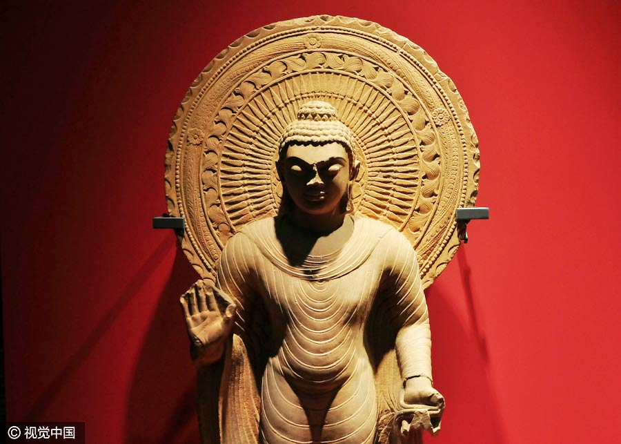 Chinese and Indian sculptures on display at the Palace Museum in Beijing