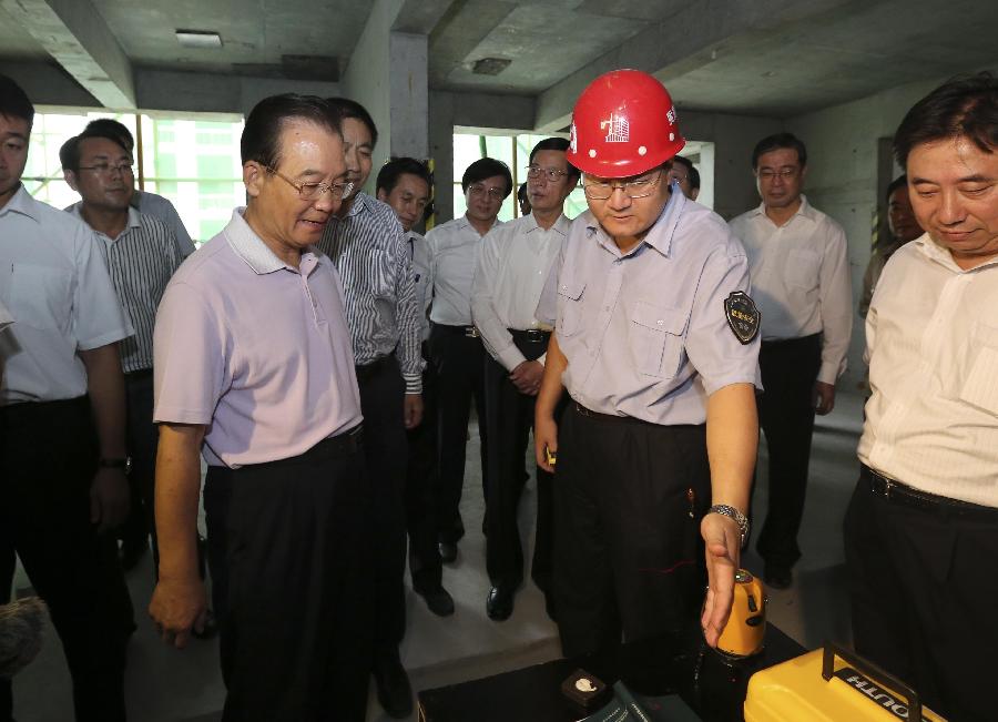 溫家寶:投入市場、群眾滿意是衡量保障性安居工程進展好壞最重要的標準