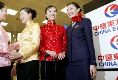 Serving Taiwan passengers in traditional attire