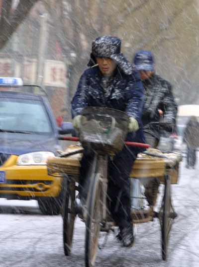 Finally, snow comes to Beijing