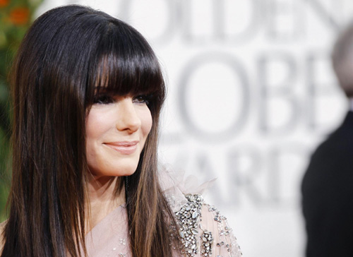 Sandra Bullock arrives at the 68th annual Golden Globe Awards