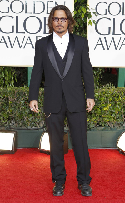 Johnny Depp arrives at the 68th annual Golden Globes Awards