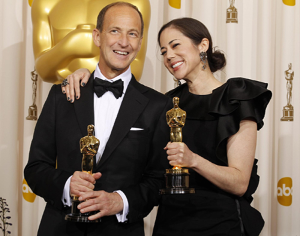 Charles Ferguson and Audrey Marrs win the Oscar for best documentary feature