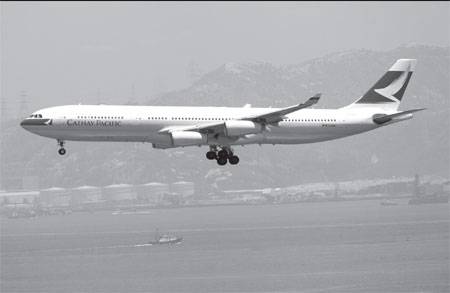 Cathay Pacifi c posts 61% net profit plunge in 2011