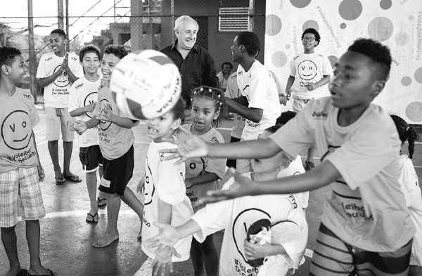 Volleyball comes home to Brazil slum kids