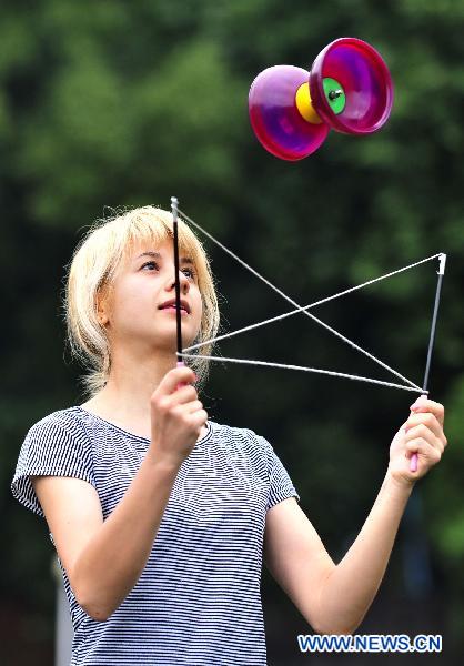 Ukrainian girl shows skills on Chinese diabolo