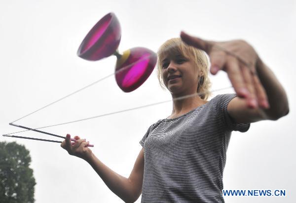 Ukrainian girl shows skills on Chinese diabolo