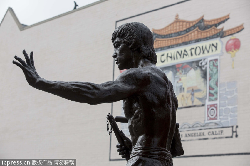 Bronze statue of kung fu star Bruce Lee on display in LA