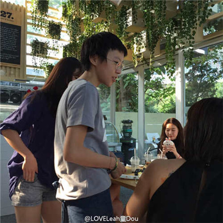 Leah Dou serves coffee in Beijing