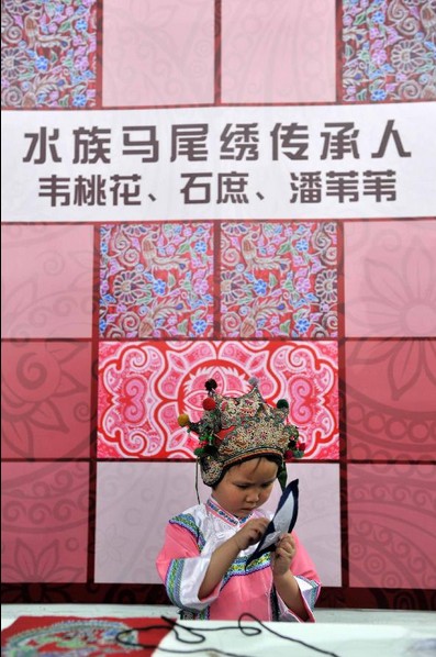 Folk handicrafts made in SW China's Guizhou Province displayed in Beijing