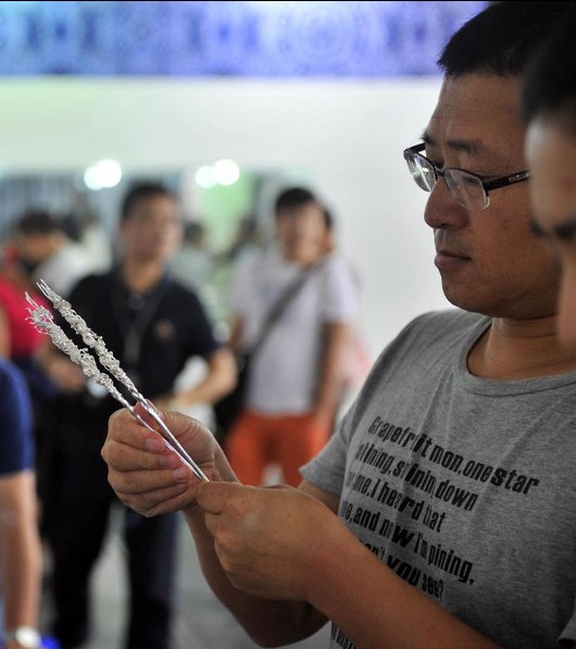 Folk handicrafts made in SW China's Guizhou Province displayed in Beijing