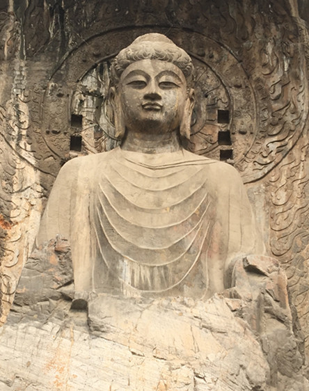 CRI reporters admire well preservation of Longmen Grottoes