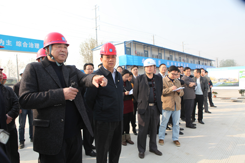 Guan Aiguo inspects Huaqiao