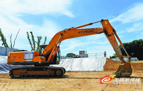 Workers toil through scorching July weather