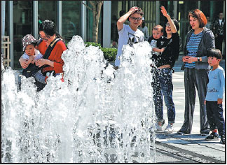 Shanghai sizzles in 120-year high heat