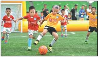 Preschool program teaches kids how to play soccer with a smile