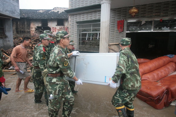 Flood and mudslide kill 29 in Central China