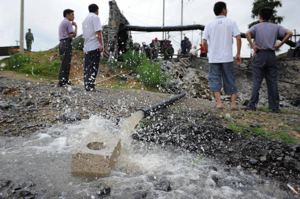 21 coal miners trapped underground in SW China