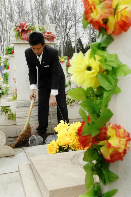 Cemetery worker helps keep resting place neat