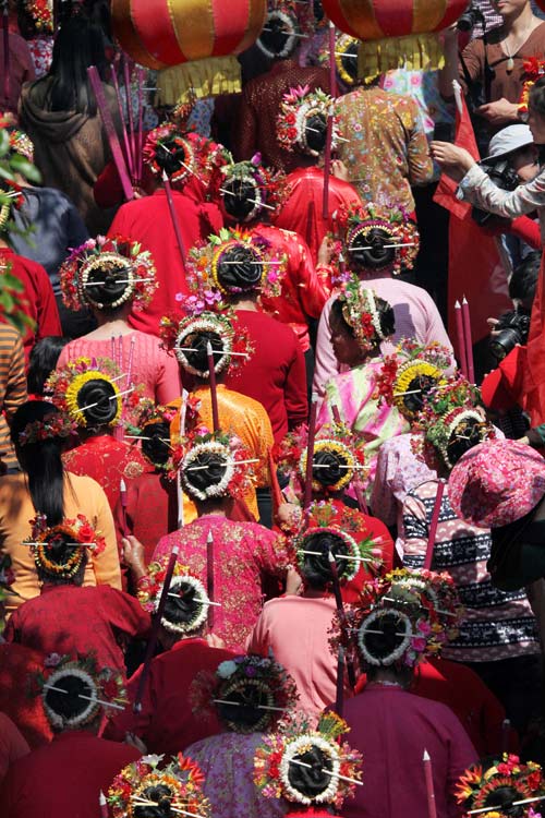 Flamboyant villagers honor sea goddess