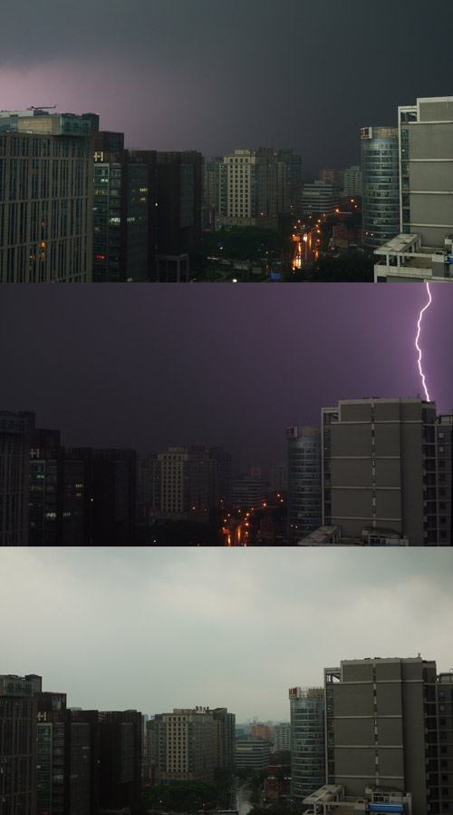 Thunder storm hits Beijing, darkening the sky