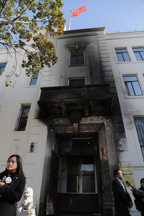 Damaged Chinese consulate open for business