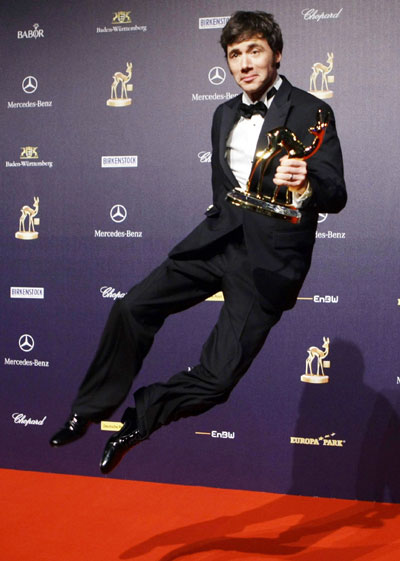 German comedian Michael 'Bully' Herbig jumps during the 60th Bambi media awards ceremony