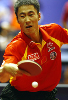 Wang Liqin on track for three medals at table tennis worlds