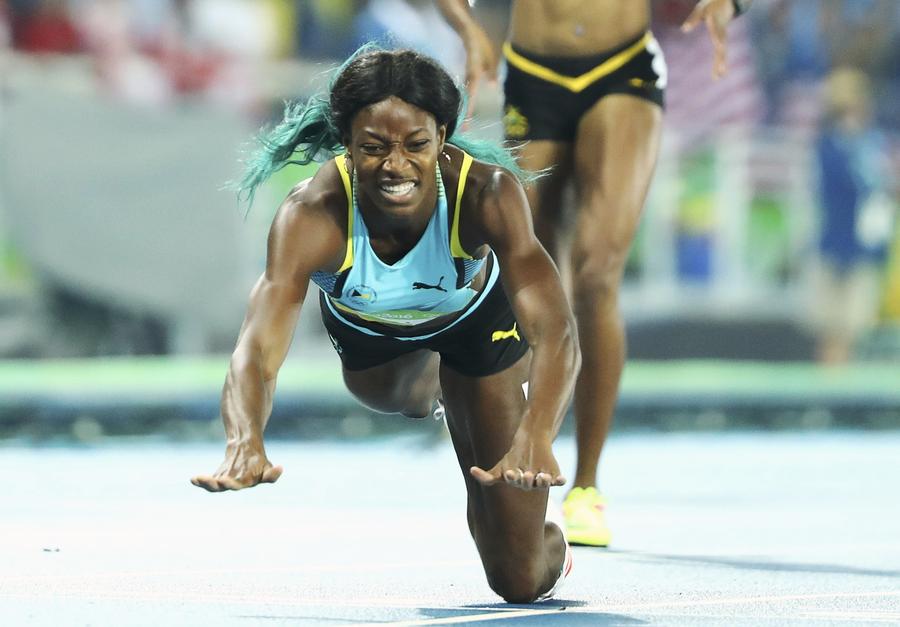 Miller dives over line to win women's 400m Olympic gold