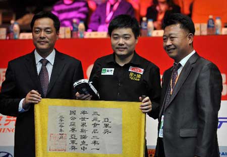 In-form snooker Ding eyes world title