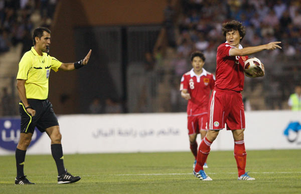 In photos: China suffers 1st loss to Jordan in 27 years