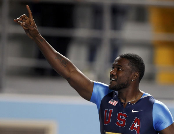 Gold for Gatlin, Eaton sets heptathlon world mark