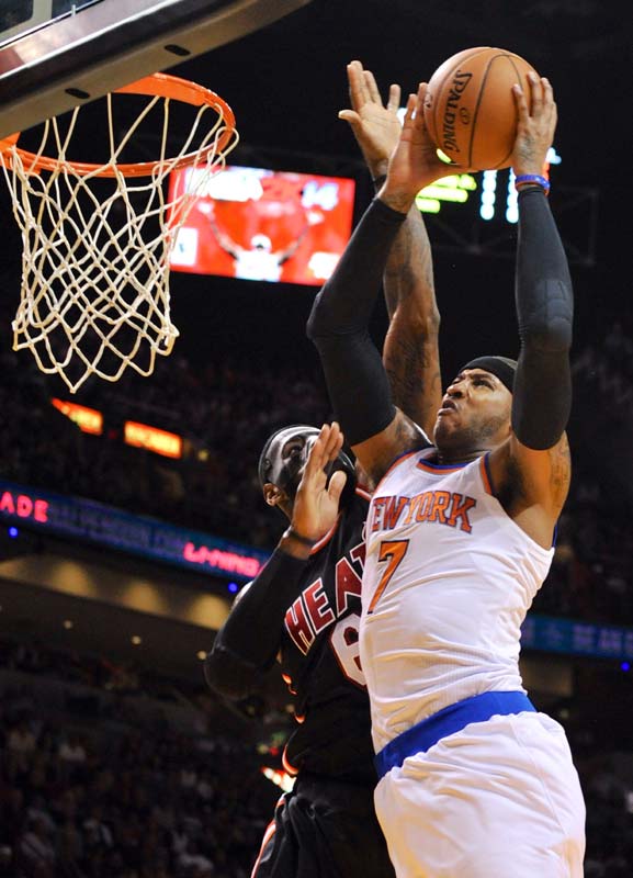 James scores 31 in a mask to lead Heat over Knicks