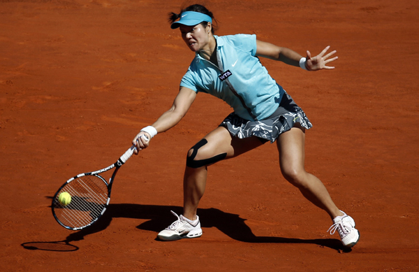 Li, Radwanska reach 2nd round at Madrid Open