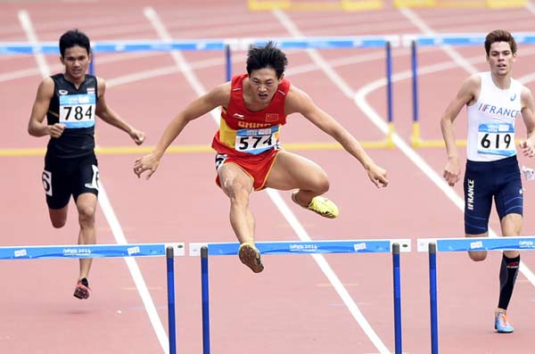 Xu wins 400m hurdles crown in cliff-hanger finish