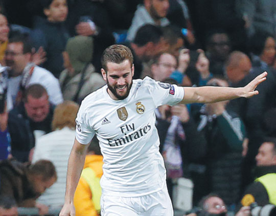 Unlikely hero Nacho lifts Real into last 16