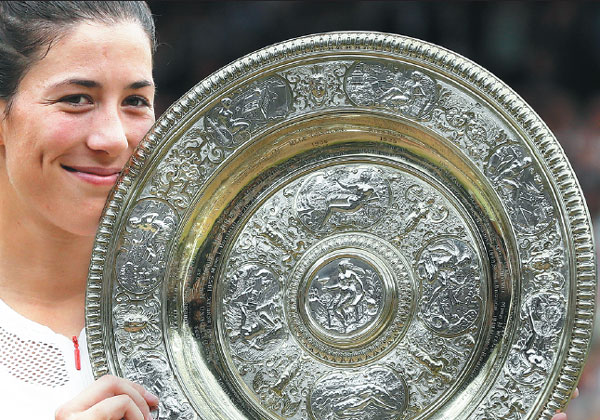 Muguruza makes her idol pay