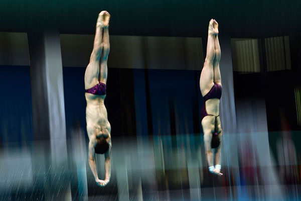 Chinese divers Ren Qian, Lian Junjie win gold at worlds