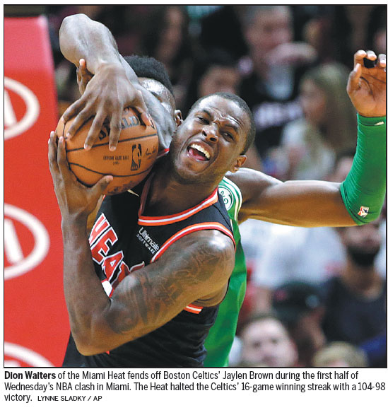 Boston's 16-game win streak scorched by Heat