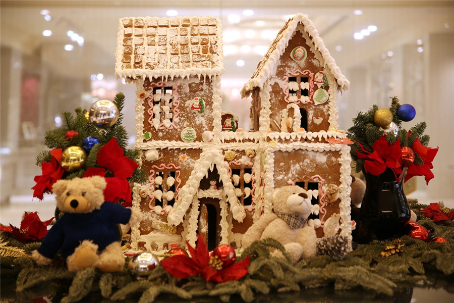 Beijing gets into Christmas spirit with illuminated trees, carols and the smell of cinnamon