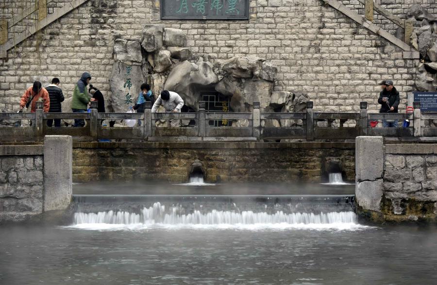 Scenery of mist-enveloped Baishi Spring in Jinan