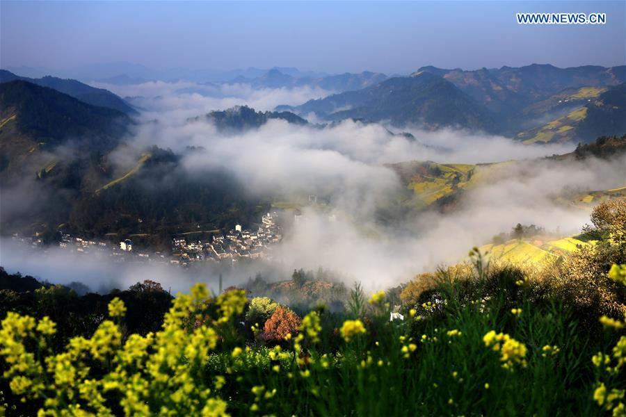 Clouds shroud ancient village Shitan, Anhui