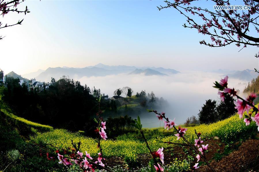 Clouds shroud ancient village Shitan, Anhui