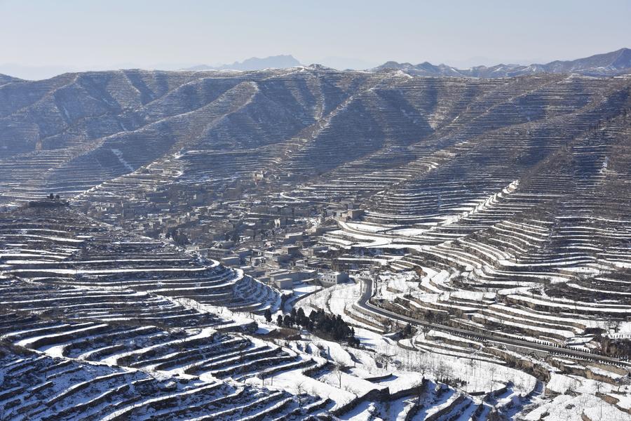 Scenery of terraced fields after snow in Hebei